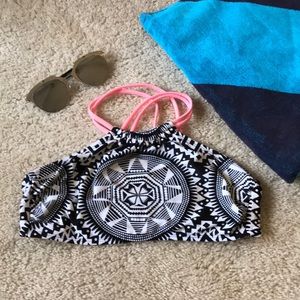 Black, white, and pink bikini top